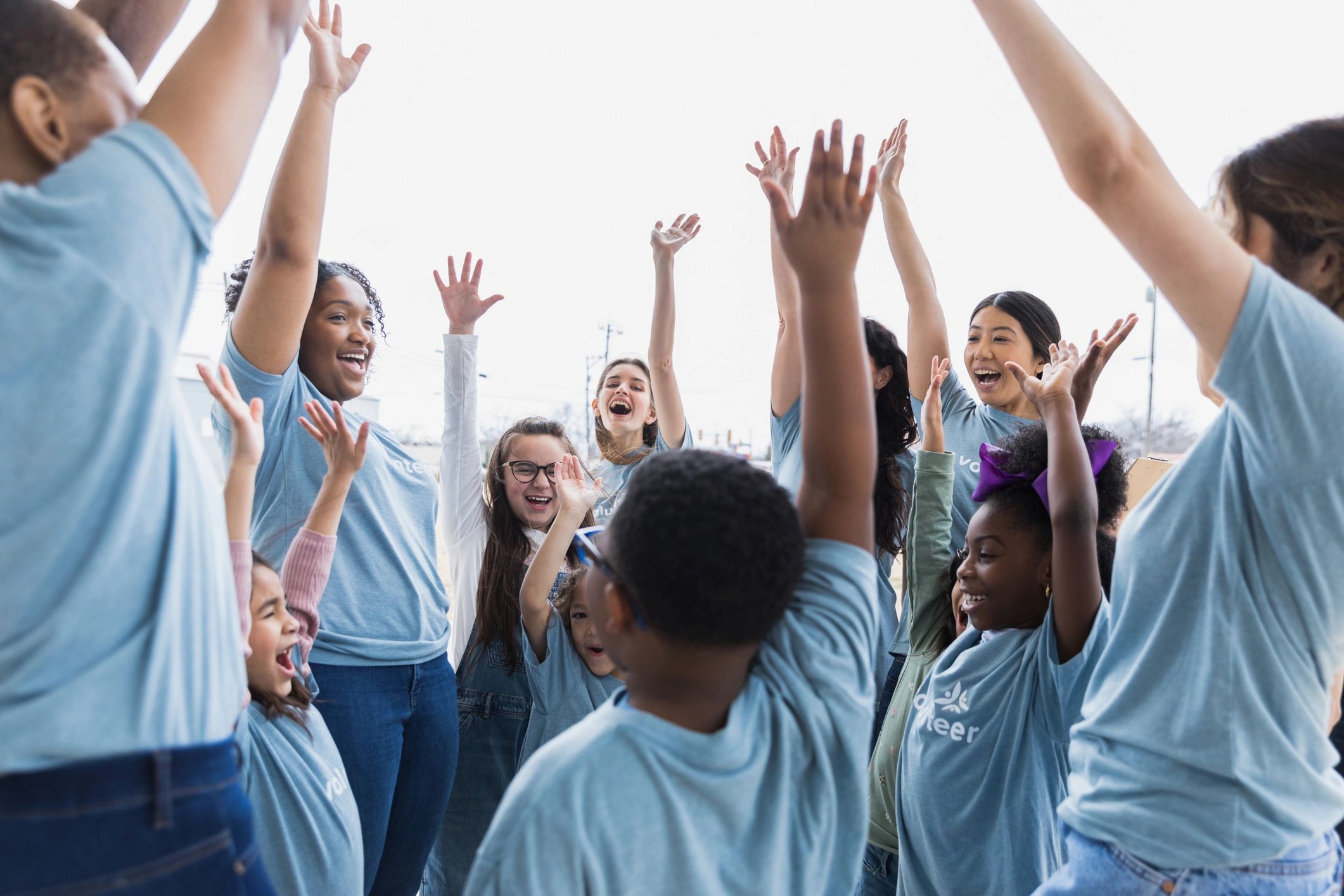 Volunteers cheering together