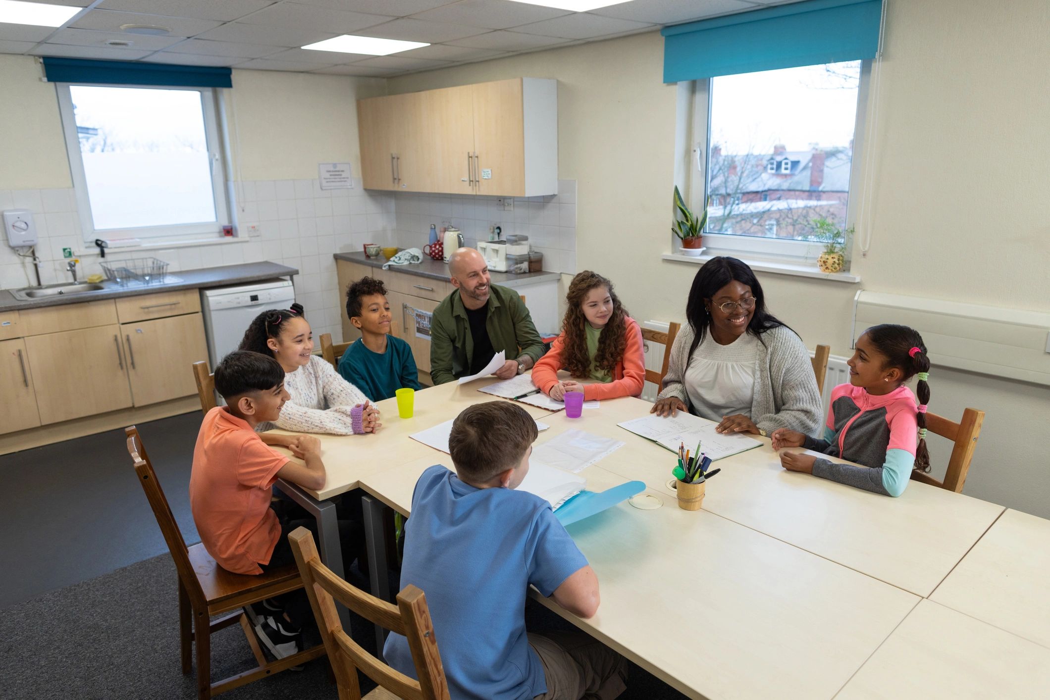 Youth group in a supportive circle discussion